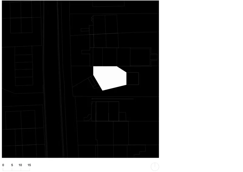 Site plan drawing showing the pentagonal building footprint set among surrounding rectangular urban blocks