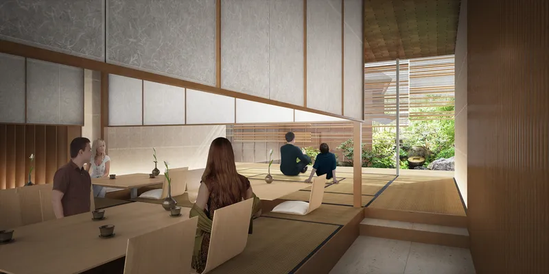 Interior seating area with low timber tables and translucent panels overlooking a courtyard garden