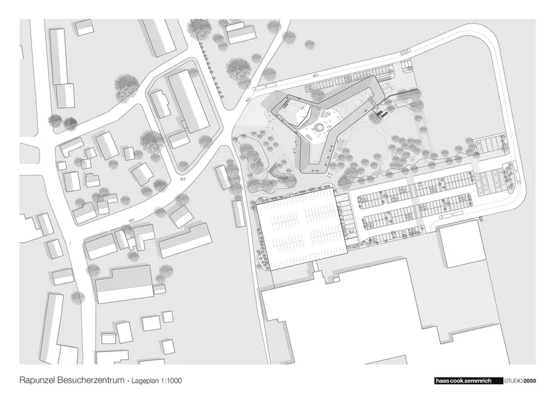 Site plan drawing showing the complex footprint with courtyard, parking area, and adjacent street context