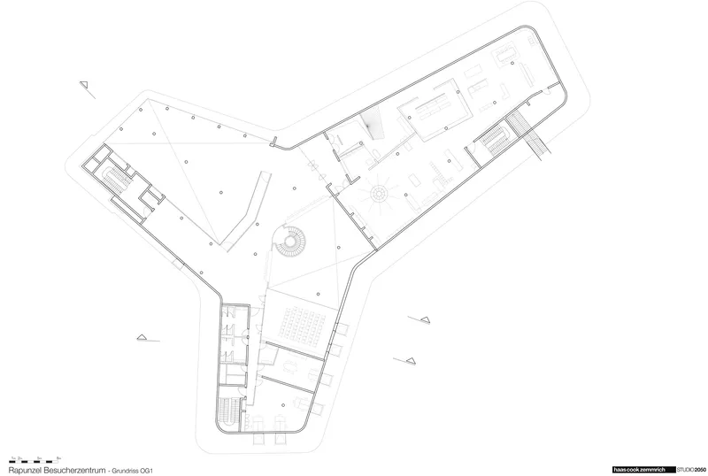 Floor plan drawing depicting the Y-shaped layout with two circular elements in the central courtyard space