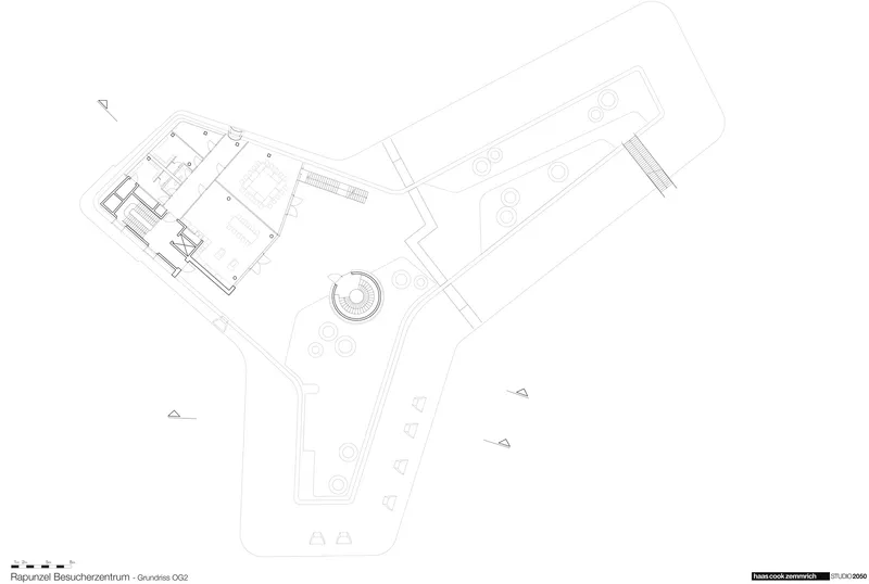 Floor plan drawing showing the Y-shaped form with circular plantings in the exterior landscape area