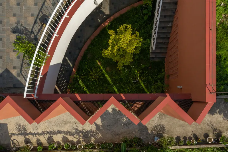 Aerial view of the zigzag sawtooth parapet and planted courtyard below