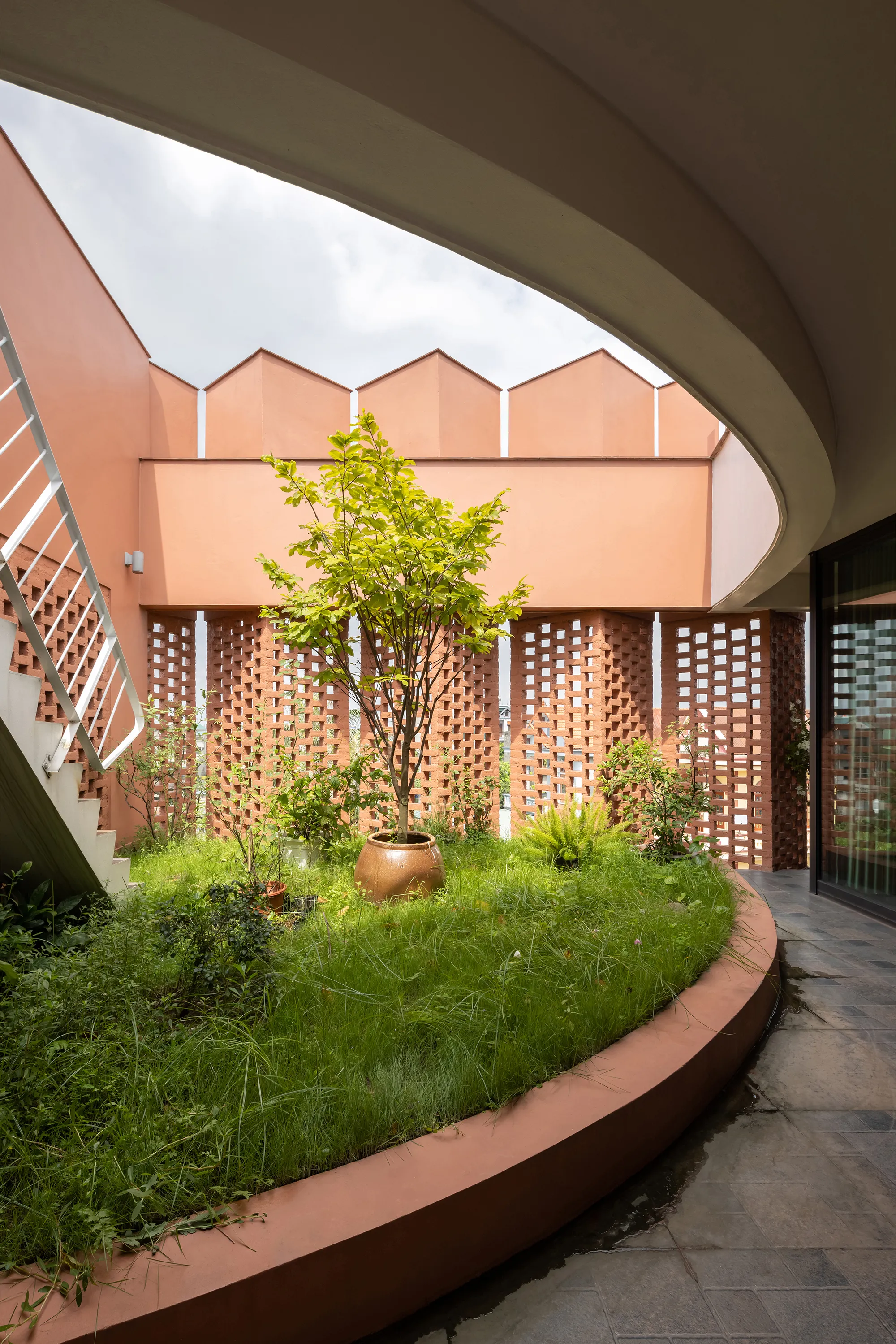 H&P Architects Wrap a Vietnamese House in Perforated Brick to Fuse Living with Agriculture