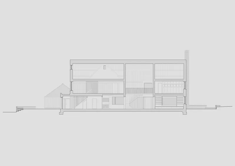 Section drawing showing interior spatial divisions with clerestory windows and a stair connection