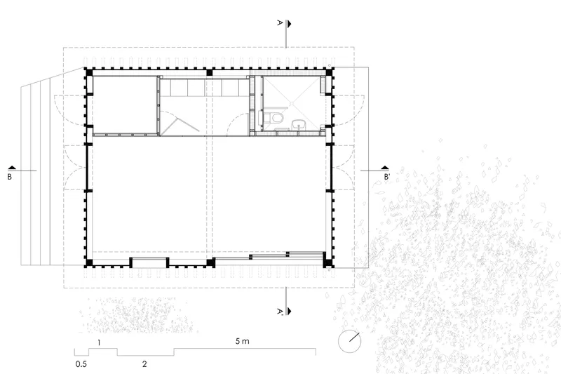Floor plan drawing showing a rectangular hall with service rooms and storage along one edge