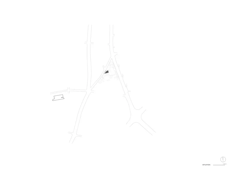 Site plan drawing showing an angular building footprint at an intersection with adjacent streets
