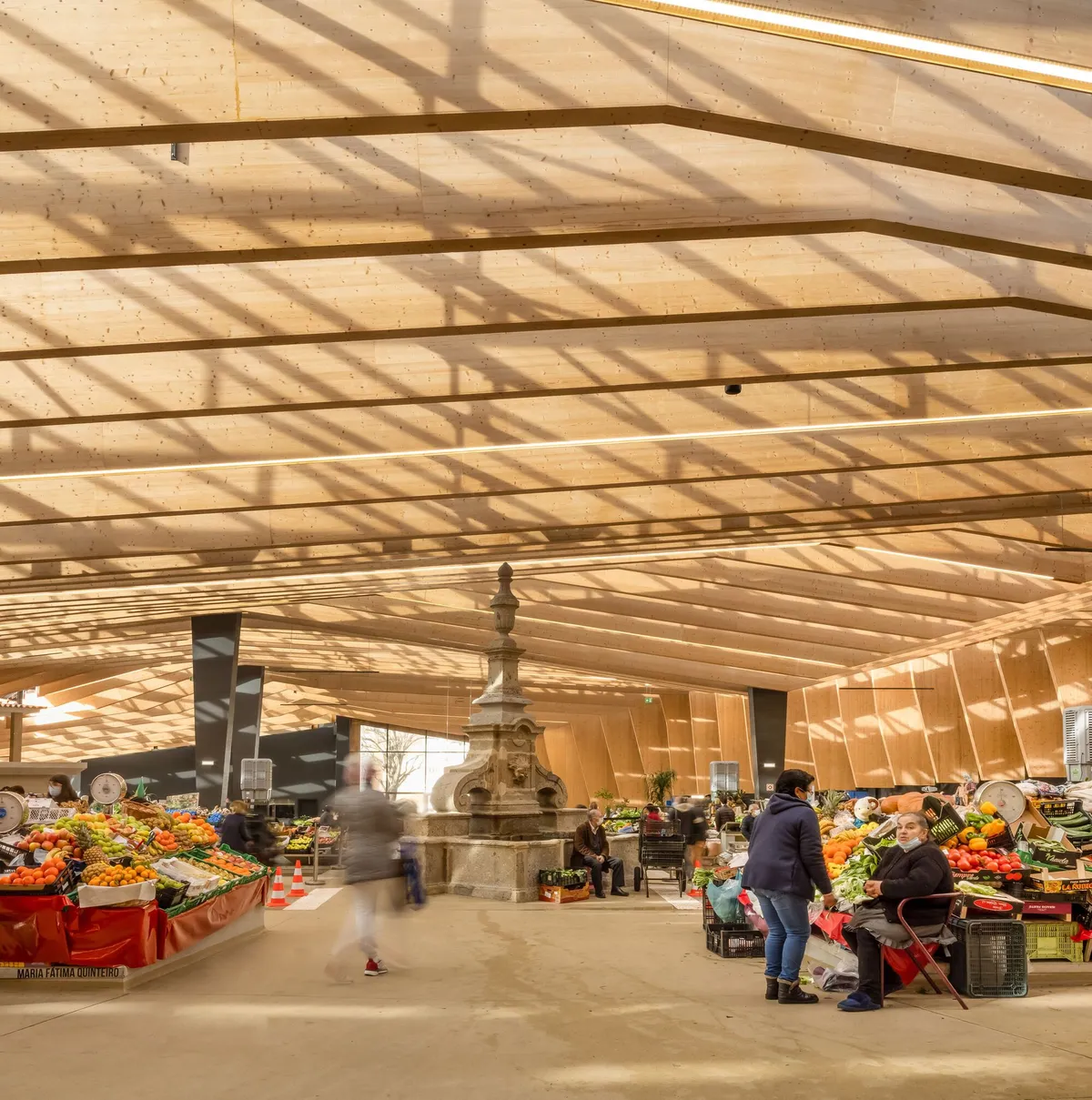 APTO Architecture Wraps Braga's 1956 Municipal Market in a Parametric Timber Canopy