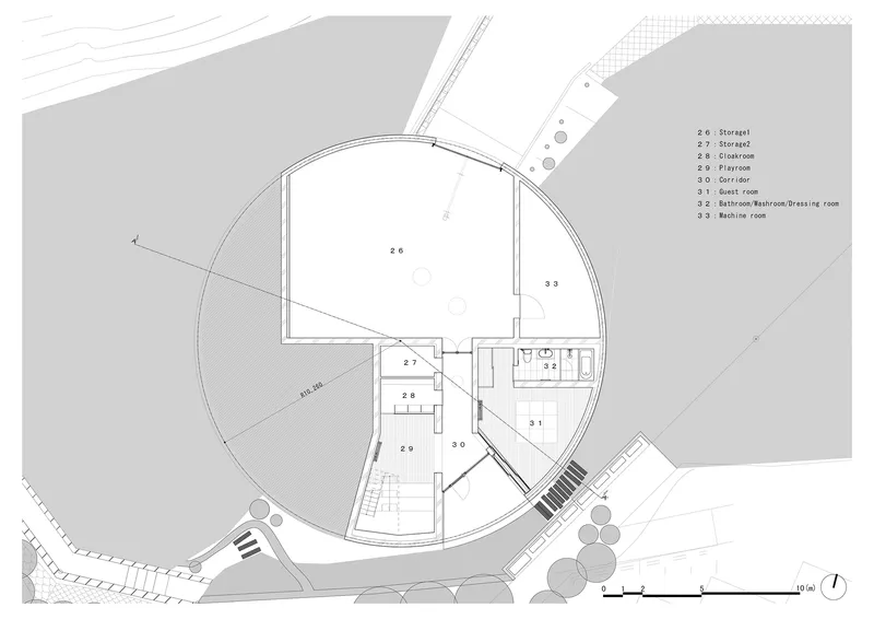 Floor plan drawing of circular residence with radiating interior partitions and room labels