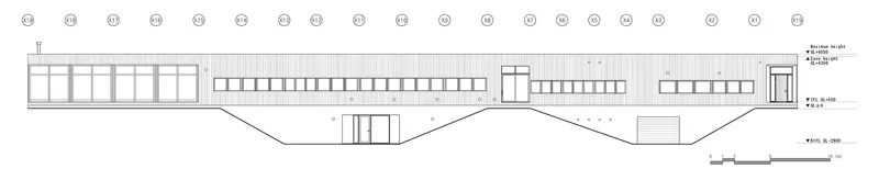 Elevation drawing showing low horizontal building with rhythmic circular elements along the roofline