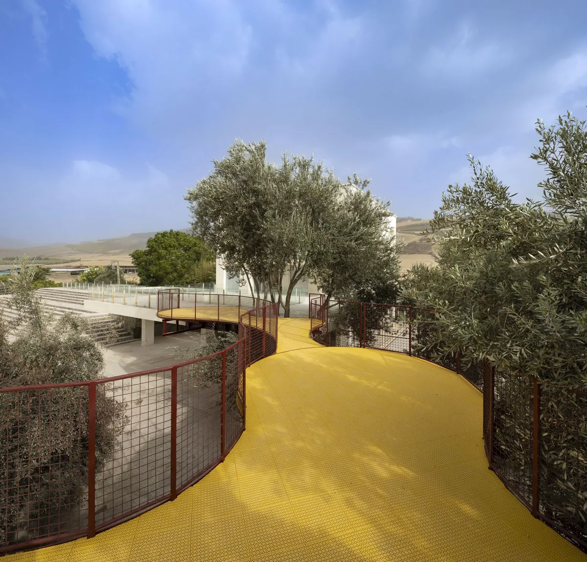 ZAV Architects Thread a Spiraling Playground Through a 40-Hectare Olive Orchard in Iran