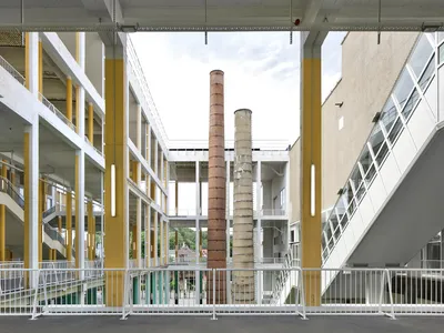 AgwA and architecten jan de vylder inge vinck Strip a 1950s Convention Center Back to Its Bones in Charleroi