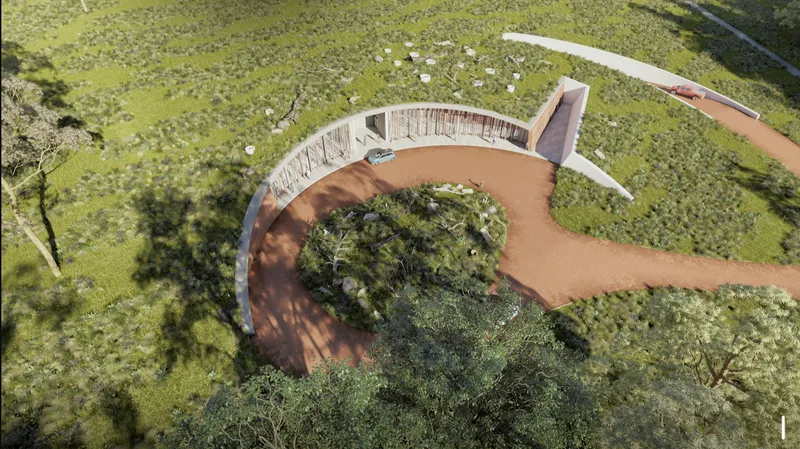 A green roof system blends the curved structure seamlessly into the surrounding Australian ecosystem.