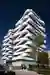 NAC Arquitectos Wraps Twin Valencia Towers in Spiraling Ribbon Balconies