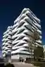 NAC Arquitectos Wraps Twin Valencia Towers in Spiraling Ribbon Balconies