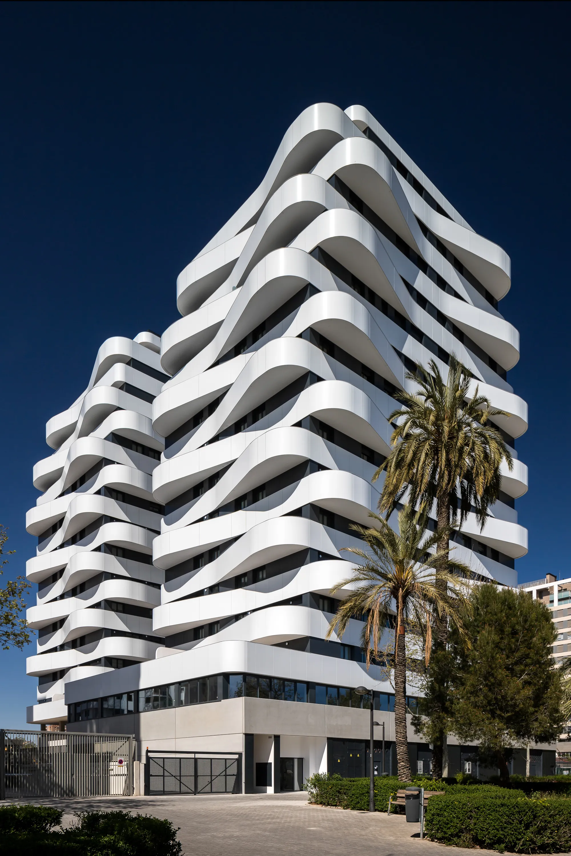 NAC Arquitectos Wraps Twin Valencia Towers in Spiraling Ribbon Balconies