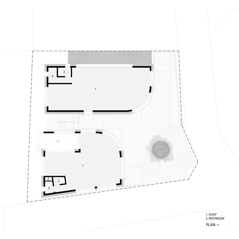 Ground floor plan drawing showing shop spaces, curved exterior seating, and adjacent tree