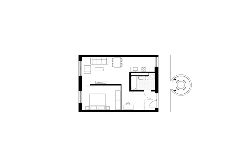 Floor plan drawing showing a compact dwelling with living area, bedroom, bathroom, and a circular outdoor element