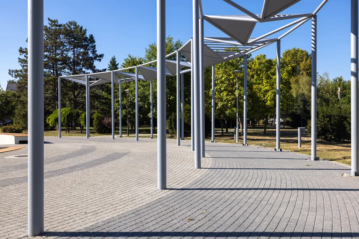 MZ Studio Architecture Gives a Serbian City Park Its Own Sun, Built from Steel, Water, and Pebbles