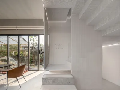 AUN Design Studio Folds an Origami Staircase Through a Multi-Generational Bangkok Home