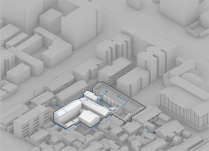 Axonometric diagram showing circulation paths in blue through the L-shaped building and courtyard