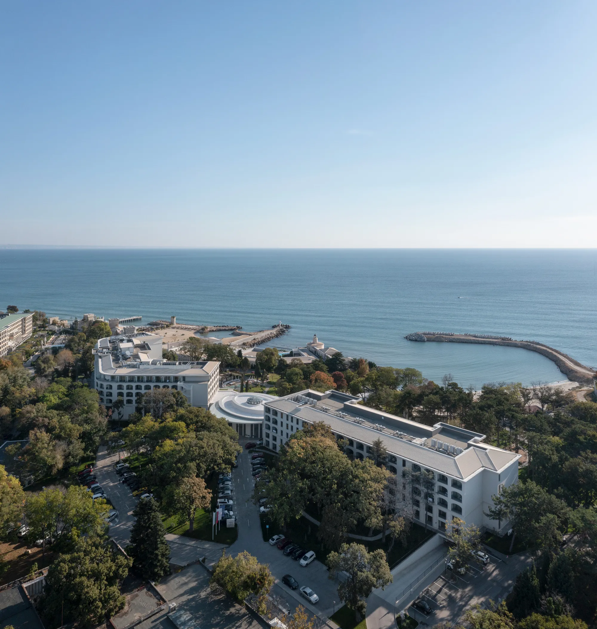 STARH Wraps 420 Rooms in Flattened Arches to Preserve a Century-Old Pine Forest on the Black Sea