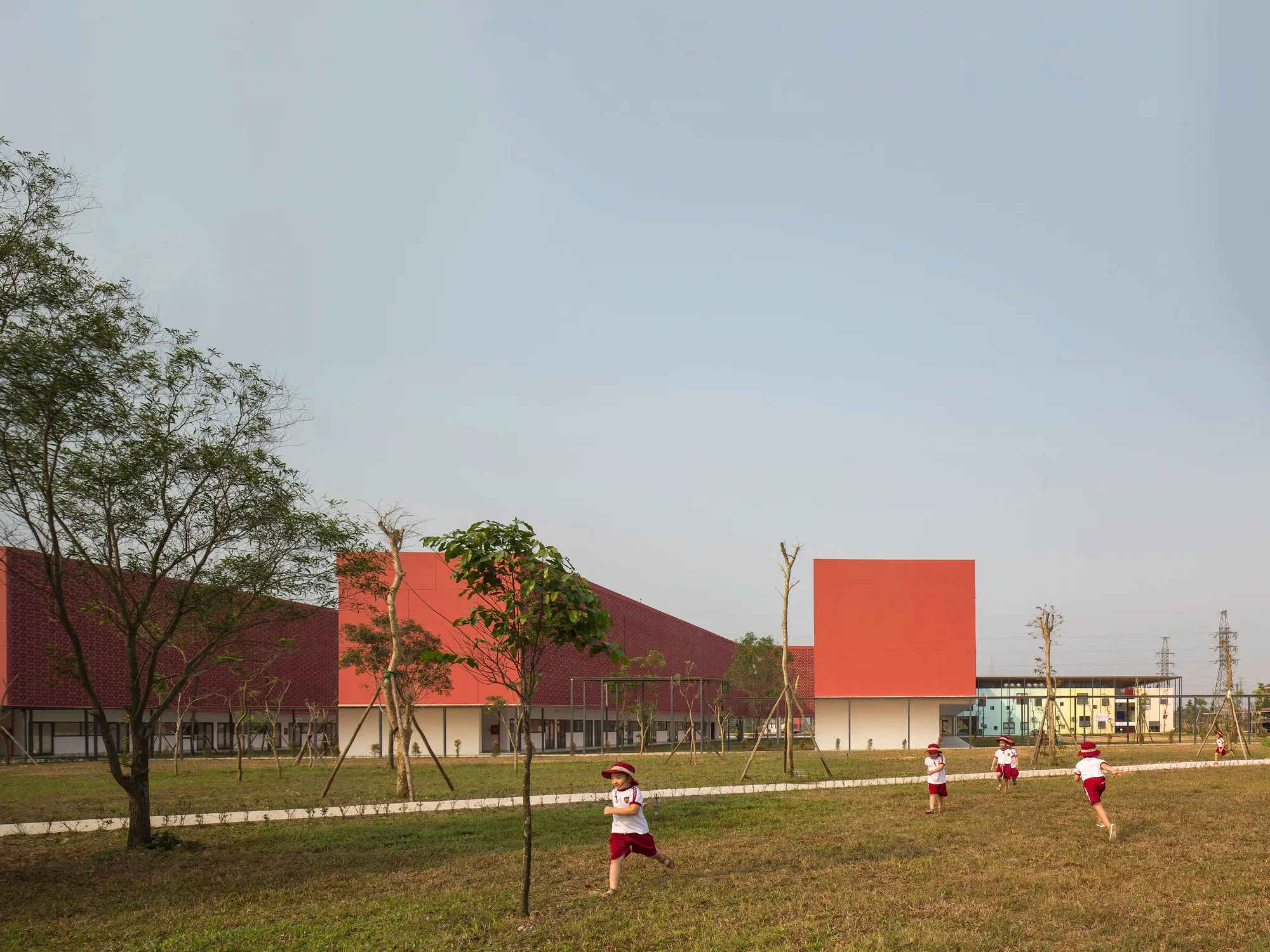 BHA Studio Wraps a 2,000-Student Campus in Terracotta Screens and Double-Layered Roofs in Central Vietnam