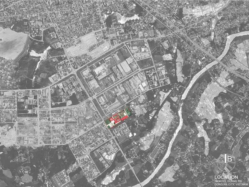 Aerial site plan showing project location marked in red within dense urban fabric