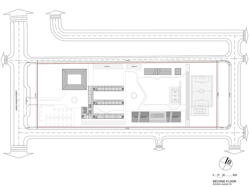 Second floor plan showing central void, offset classroom bars and rooftop terrace areas