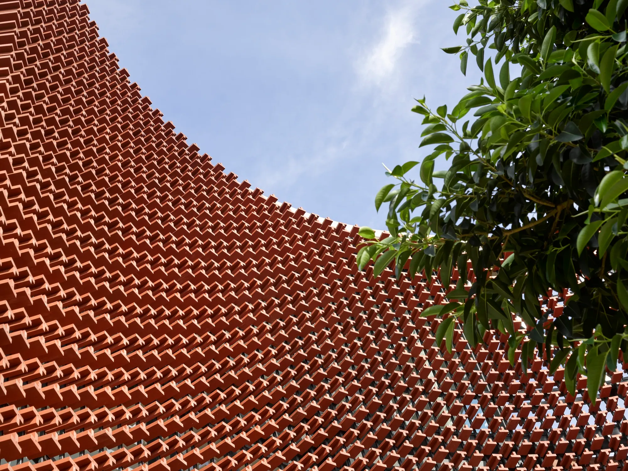 bureau^proberts Wraps a Brisbane Commercial Center in a Clay Screen That Inverts the Brick