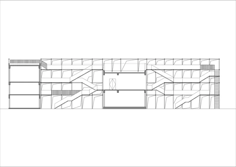 Section drawing revealing paired staircases framing a central atrium within an angled structural frame system