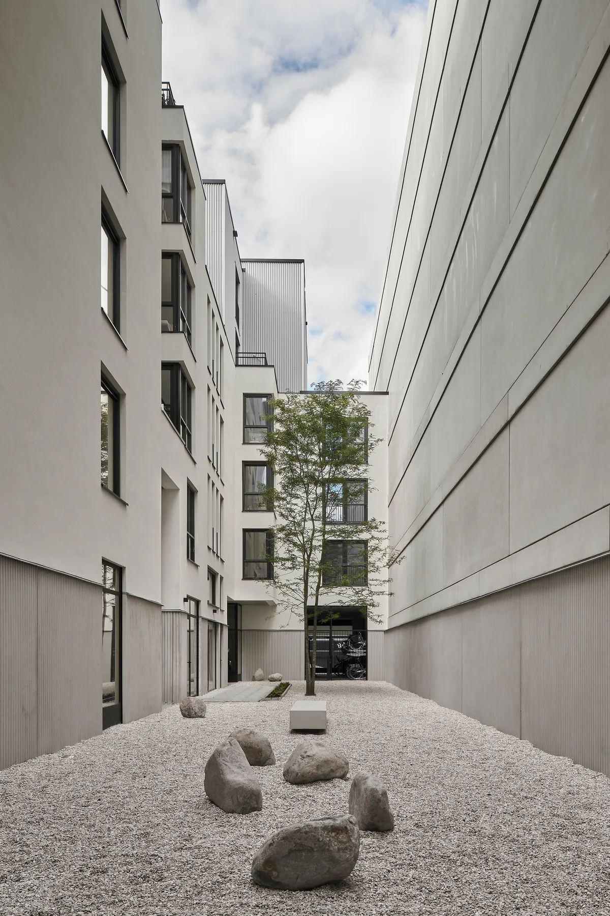 Common Practice and Studio AAAN Carve a Hidden Courtyard World into Amsterdam's Narrowest Plot
