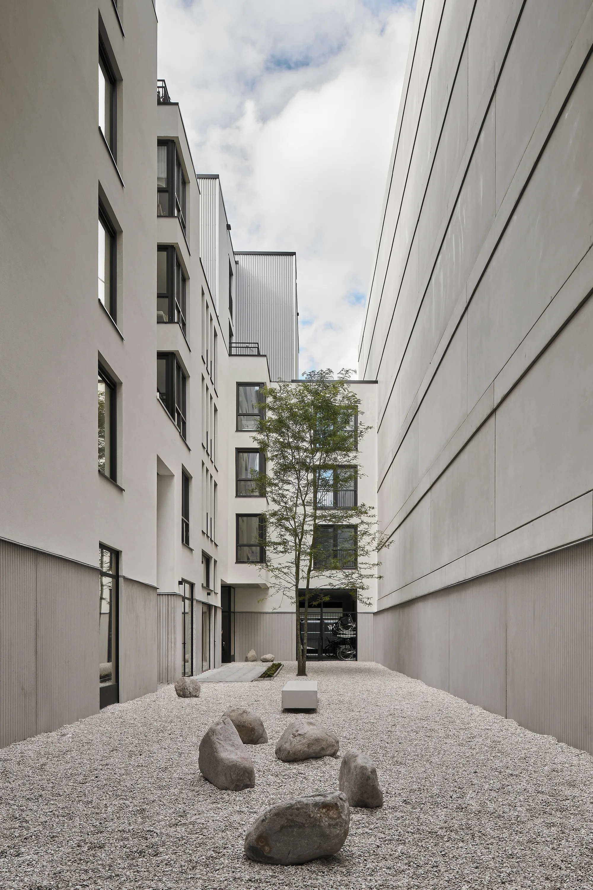 Common Practice and Studio AAAN Carve a Hidden Courtyard World into Amsterdam's Narrowest Plot