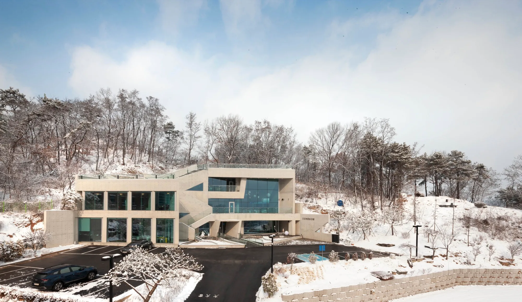KARO Architects Carve a Concrete Café and Community Hub into a Korean Hillside