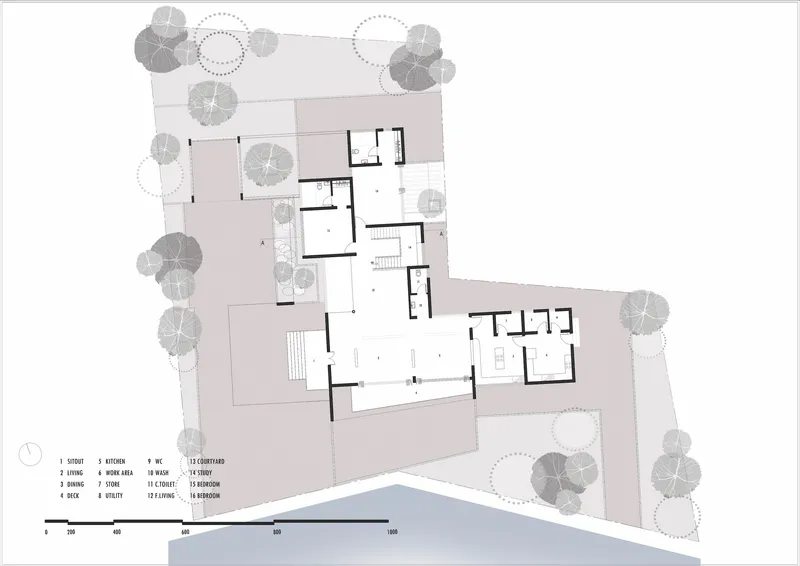 Site plan drawing showing L-shaped building footprint with courtyard pool and surrounding tree canopy