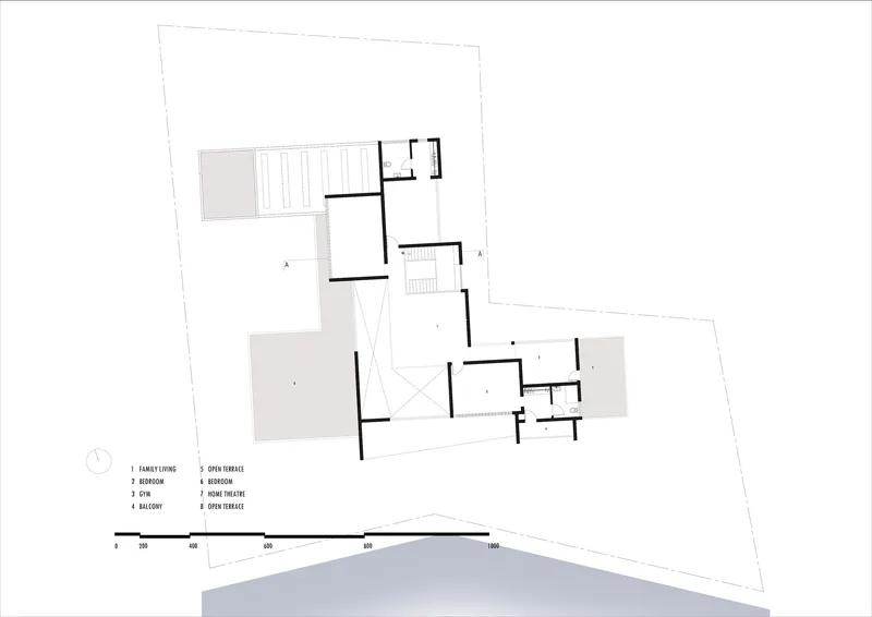 Upper level floor plan drawing depicting bedroom wing, terrace, and internal circulation across angular volumes