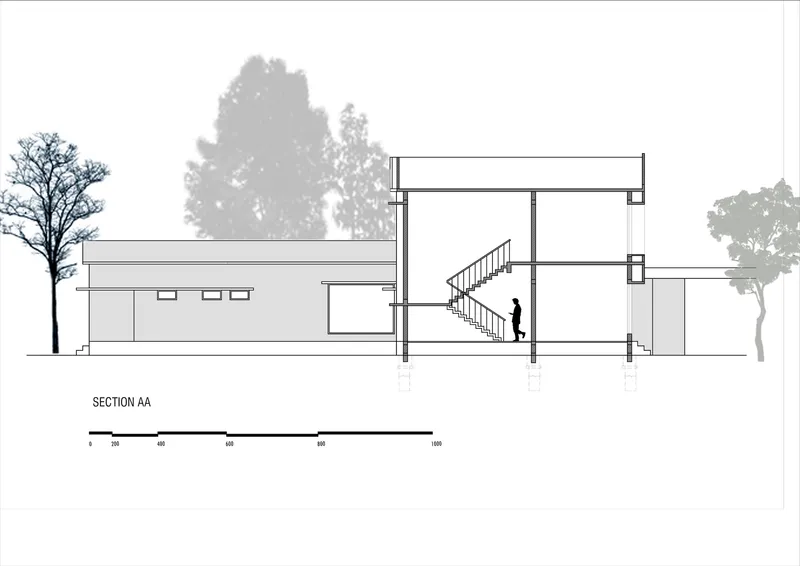 Section drawing showing double-height stairwell, flat roof profile and flanking tree silhouettes