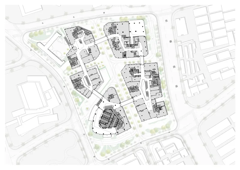 Site plan drawing depicting mixed building footprints with landscape elements and adjacent street grid