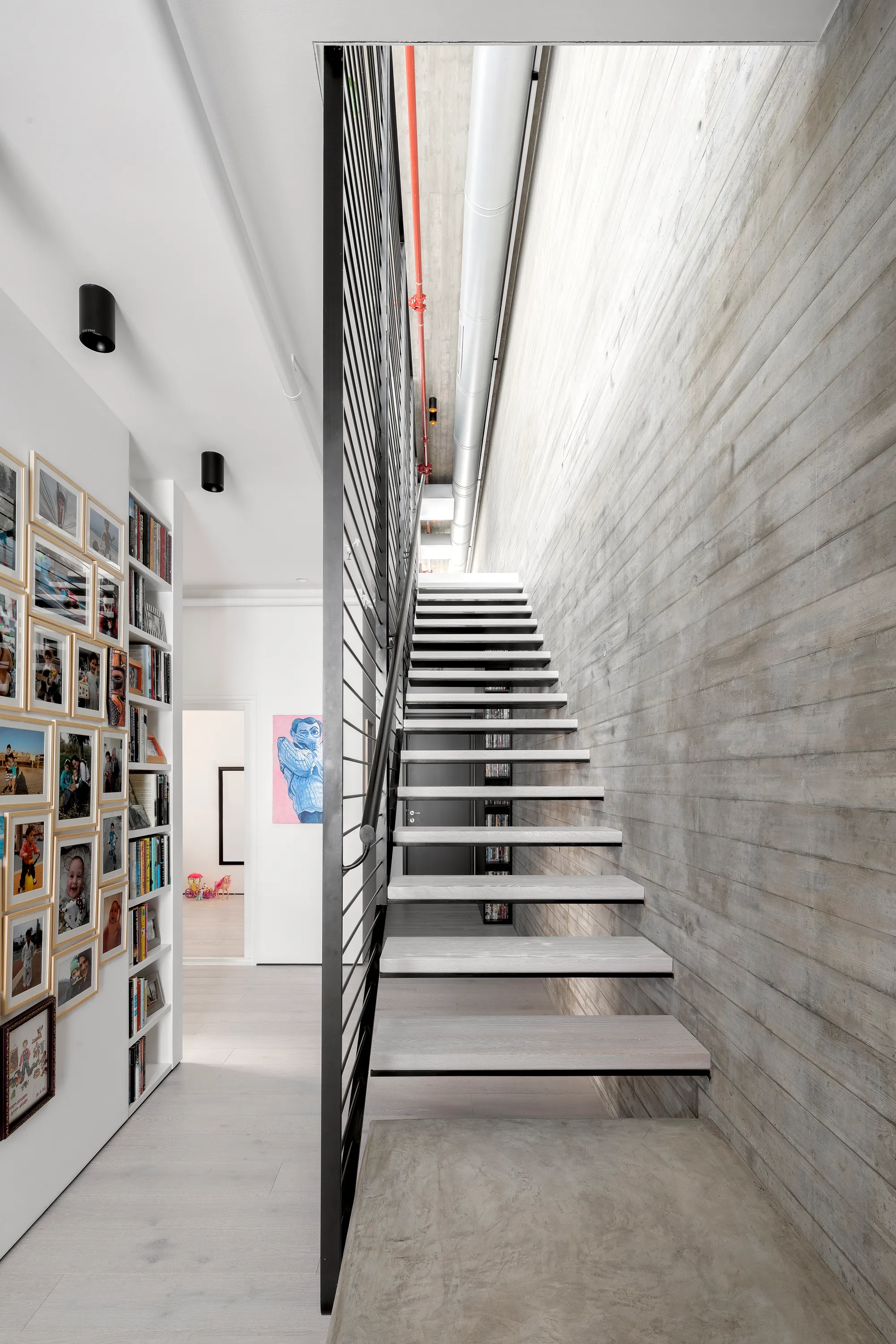 Erez Shani Architecture Flips a Tel Aviv Duplex Upside Down to Chase Light and Air