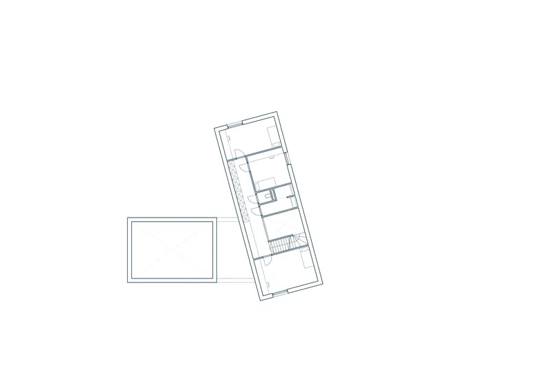 Upper floor plan drawing showing elongated rectangular volume with rooms and stair