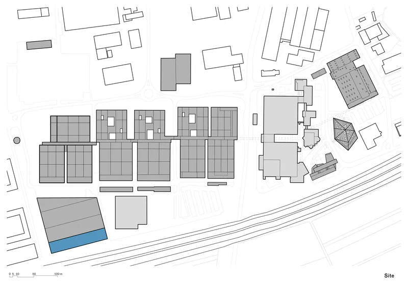 Site plan drawing depicting five linear warehouse structures and the surrounding urban fabric