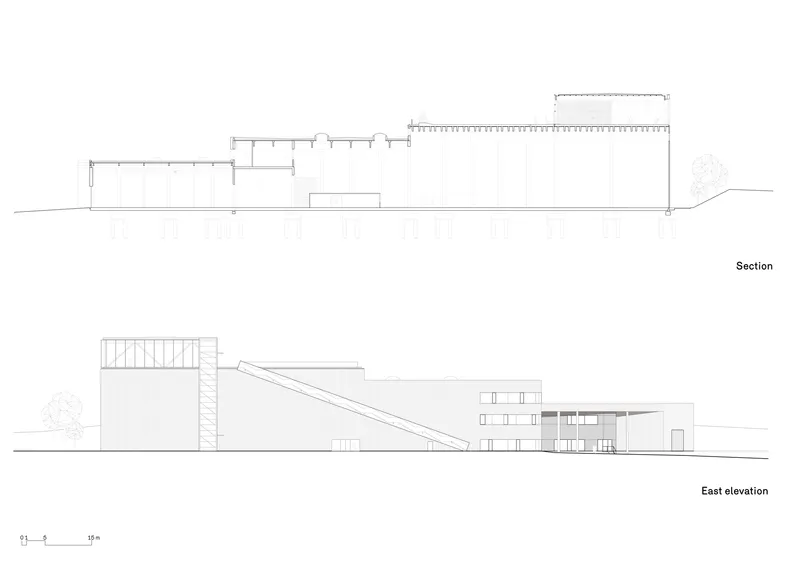 Section and elevation drawings showing the sloped roof profile and horizontal warehouse volumes