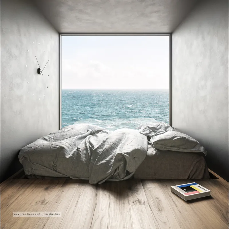Minimal living unit framing uninterrupted panoramic ocean views from the offshore residential capsule.