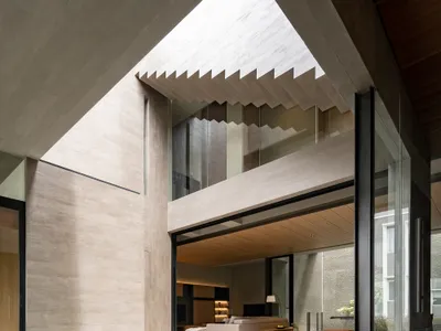 studiokian Carves a Private Courtyard World from a Dense Suburban Block in Indonesia