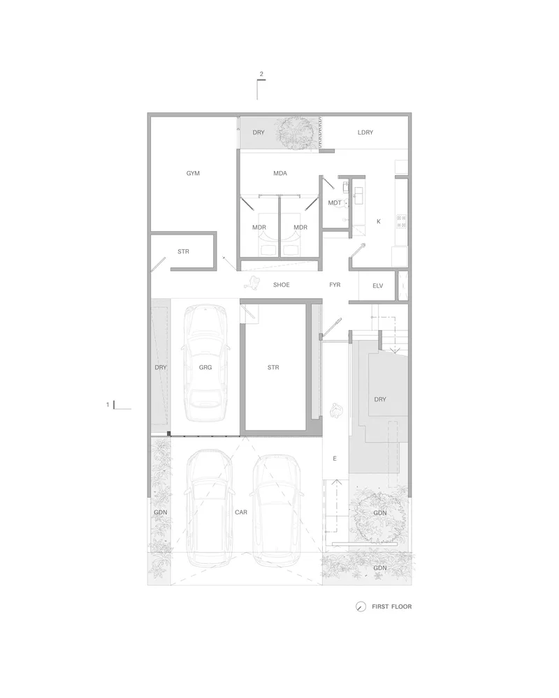 First floor plan drawing showing garage, gym, storage rooms, and multiple bedrooms with bathrooms