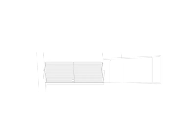 Floor plan drawing showing two rectangular volumes with decking on the left and enclosed spaces on the right