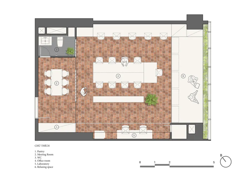 Floor plan showing an open workspace with terracotta tile flooring and central meeting table