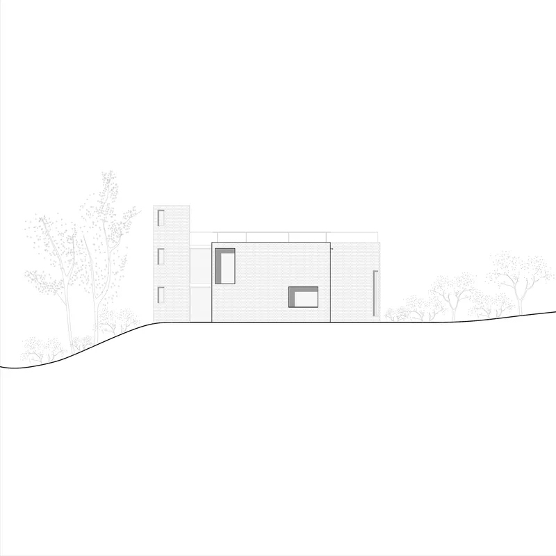 Elevation drawing showing a three-story tower and horizontal volume with framed openings on sloping terrain