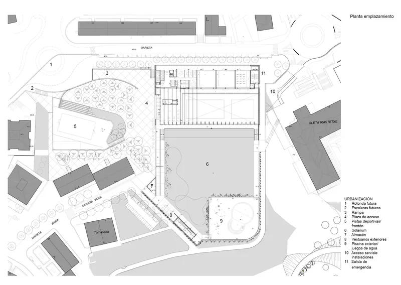 Ground floor site plan showing the building footprint with numbered zones and surrounding landscaped areas