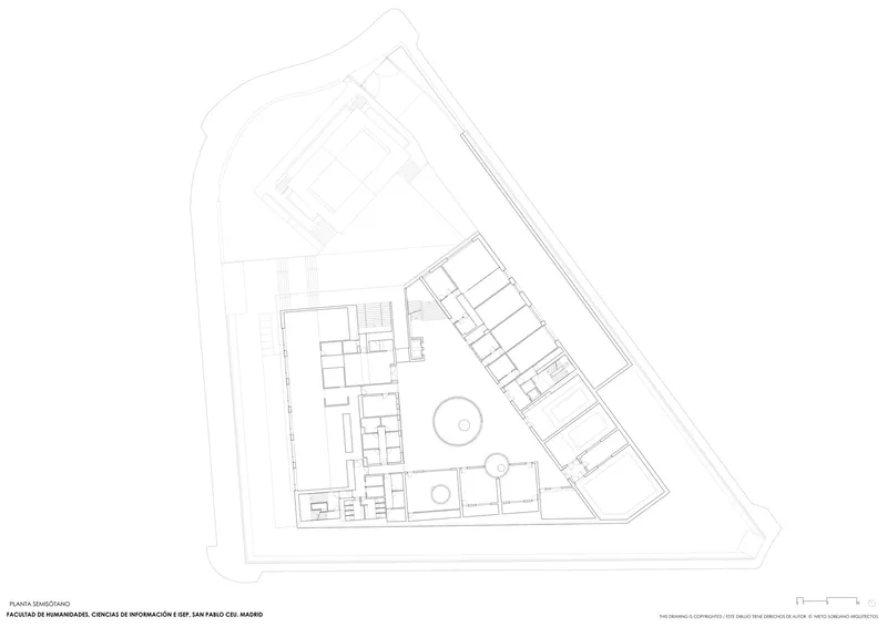 Upper floor plan drawing showing classroom or office rooms arranged along the perimeter of the triangular site