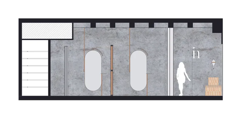 Section drawing illustrating two oval pools with dividing partition and figure for scale